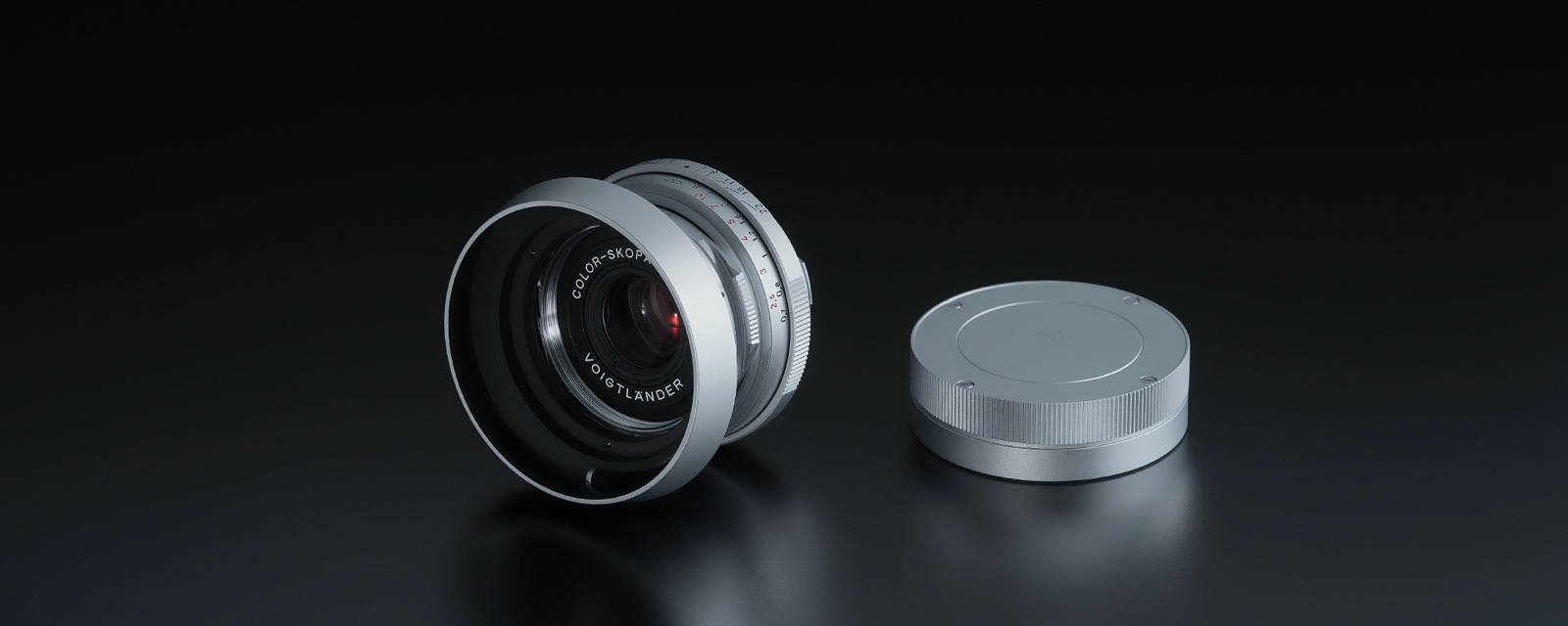 COLOR-SKOPAR 35mm F2.5 SKOPAR 100th model 실버 렌즈와 리어캡